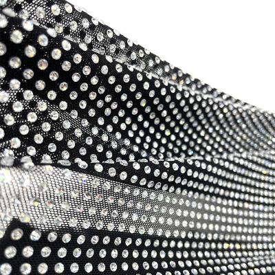 China Flatback S590 Full Rhinestone Net Gauze Fabric 2mm Crystal Bling Rhinestone Fabric For Theater Costume for sale