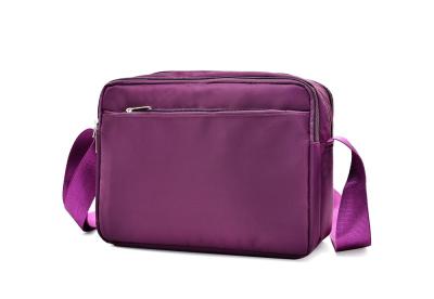 China Small Purple Travel Messenger Bag For Women Durable Customized Logo for sale