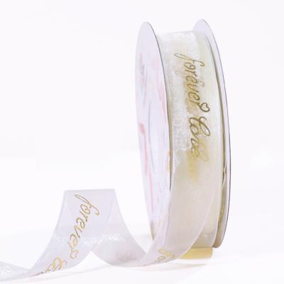 China Viable Custom Digital Printing Gold Logo Polyester Satin Ribbons For Wedding And Bag for sale