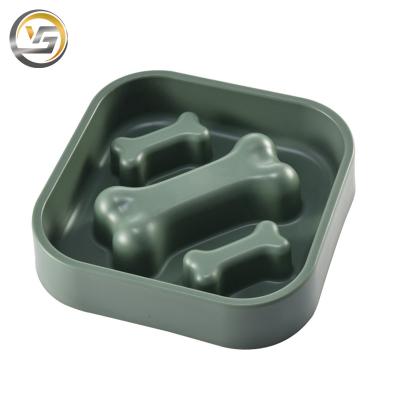 China RTS YUSO Viable Hot Selling New Design Bone Shape Portable Plastic Slow Feeder Pet Food Bowl Base Non-slip for sale