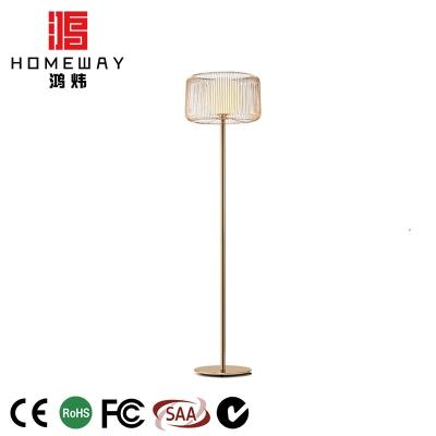 China Fashion Modern Iron Light Brass Floor Lamp White Glass Shade Living Room Position Lamp for sale