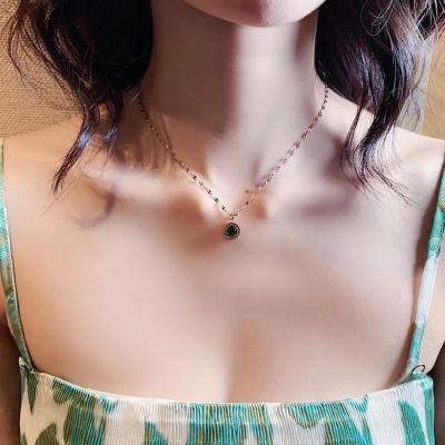 China Romantic wholesale Korean style green diamond plated romantic digital titanium female crystal steel necklace for sale