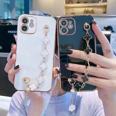 China Luxury Waterproof Flower Wrist Chain Bracelet Plating Phone Case For iPhone 14 13 pro Max Plating Shockproof Protective Back 12 11 Case for sale