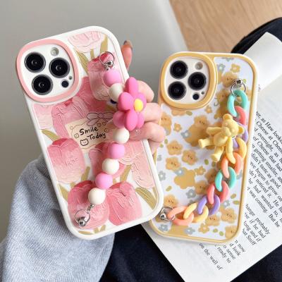 China Silicon Bear Flower Wrist Strap Chain Phone Case For iphone 13 14 pro 14 max plus Oval Fower Silicone Lens Protector Cover for sale