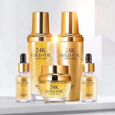 China Perfect Skin Care Vitamin C Hyaluronic Acid 24k Gold Foil Natural Face Set Anti Aging Skin Care Whitening Serum for sale