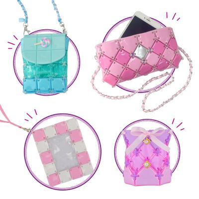 China 4 in 1 Education Toy Custom Logo DIY Christmas Gifts New Girls Purse Opener Mini Handbags for Kids for sale