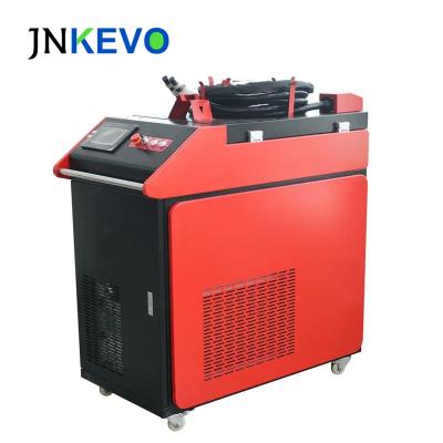 China Metal Surface Cleaning Max 1000W 1500W 2000W Handheld Portable Fiber Laser Machine Metal Cleaning Rust Removal for sale