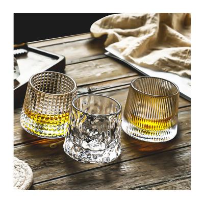 China Stored Rotating Glass Beer Shaker Tumbler Cup Creative Bar Whiskey Gyro Cup Household Glass for sale