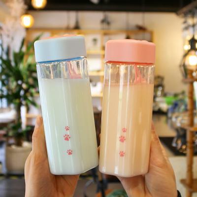 China Lovely Cat Paw Water Bottle Creative Cute Transparent Viable Plastic BPA Free Milk Drink Cup Cups With Handle for sale