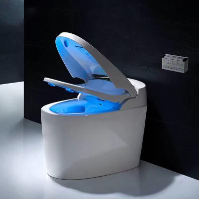 China Automatic Operation Luxury White Ceramic One Piece Smart Rimless Toilet Electronic Floor Mounted Smart Bidet for sale