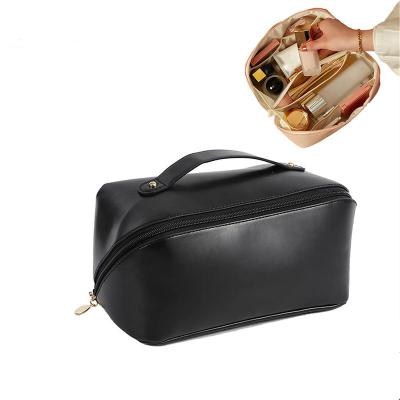 China 2022 Higher Sense Travel Toiletries Storage Bag Portable Durable Leather Female INS Large Capacity PU Makeup Bag New for sale