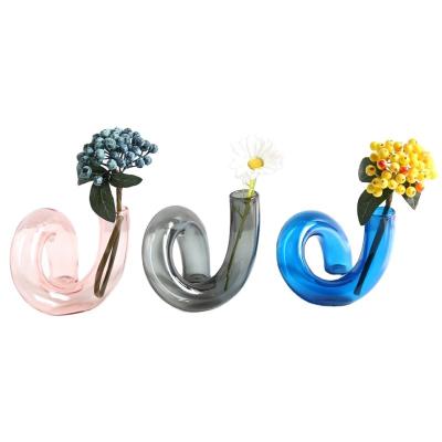 China Minimalist Creative Irregular Color Shaped Vase Glass INS Wrap Transparent Vase Flower Arrangement Candlestick Living Room Art Decoration for sale