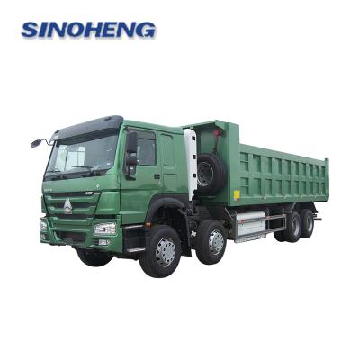 China cnhtc 8x4 sinotruk howo dump truck for tanzania > 8L for sale