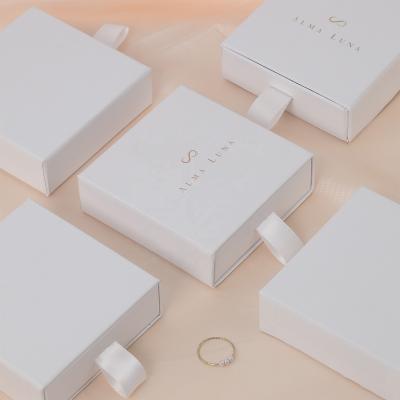 China Wholesale Custom Eco-Friendly Necklace Bracelet Earring Ring Box Drawer Jewelry Packaging Logo White Cardboard Jewelry Box And Paper Pouch for sale