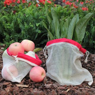 China Eco-Friendly Reusable Shopping Vegetable Drawstring Bag Folding Net Bag 100% Cotton Organic Eco Friendly Mesh for sale