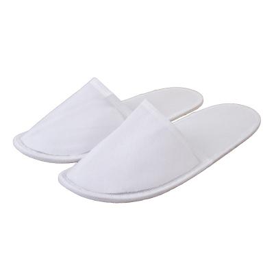 China Cheap Disposable Natural Degradable Hotel Slippers Nonwoven Embossed Embossed Slippers Guest Room Slippers Eco-Friendly Use for sale