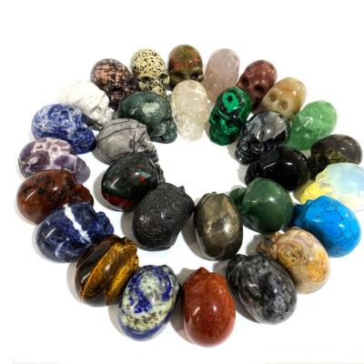 China Europe Wholesale Natural Crystal Skulls 2 Inch Various Rock Healing Crystal Skulls for sale