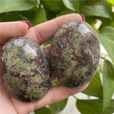 China Wholesale Natural Polished Stone from Europe Dragon Blood Stone Crystal Palm for Decoration for sale