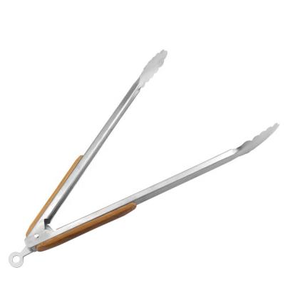 China Sustainable Stainless Steel Barbecue Tongs With Wooden Handle for sale