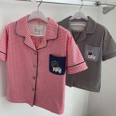 China Fashion Breathable Two-Piece Home Wear Cotton Lapel Button Grid Button Sleepwear Boy Girl Children Pajamas Suit for sale