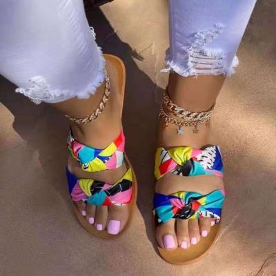 China Bowknot flat bottom fashion trend women's sandals 2021 cheap women's slippers fashion trend satin flat sandals for sale