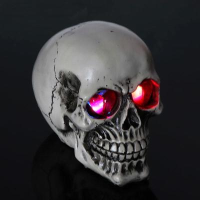 China non-toxic material & Good Custom Paint Skeleton Skull Head Shape Vinyl Toys Figure, OEM Polyresin Halloween Skull Head Night Light For Decoration for sale