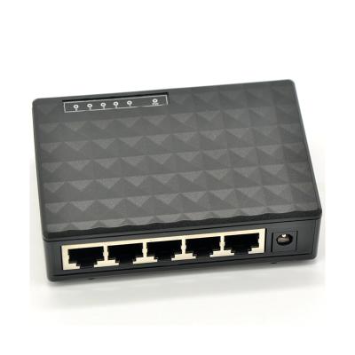 China Low MOQ Full Gigabit 5 Ports 10/100/1000Mbps Fast Ethernet Switch With Plastic Shell 16Gbps for sale