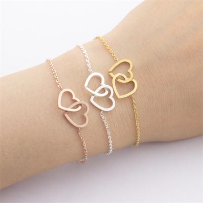 China New Fashion Trendy Double Heart Bracelets Stainless Steel 18k Gold Plated Love Heart Bracelet For Lovers for sale