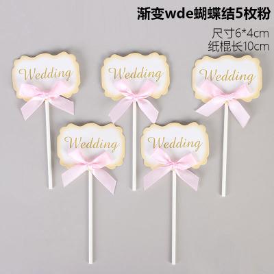 China Ribbon Bow Decorative Wedding Party Printed Letters Cardboard Topper Cupcake Cake Toppers for sale