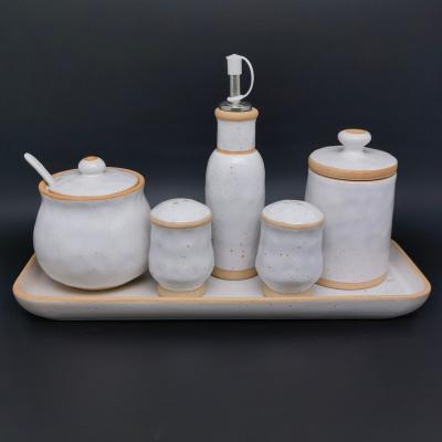 China OEM Pottery Condiment Set Porcelain Jar Custom Viable Condiment Jar Ceramic Spice Container Sets With Lids for sale