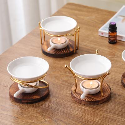 China OEM ODM AROMATIC Custom Perfume Ceramic Oil Wax Burner Logo Porcelain Wax Melt Burner with Metal Stand and Wood Stand for sale