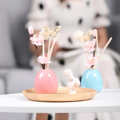 China Keeping Fresh Air OEM Custom Reed Diffusers Fragrance Diffuser Egg Porcelain Shape Ceramic Tubular Diffuser Bottle for sale