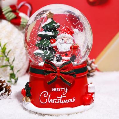 China Europe Christmas Snow Globe Color Changing 80mm 100mm Water Lighted Musical Globe with Santa Claus and Snowman, Battery Operated for sale