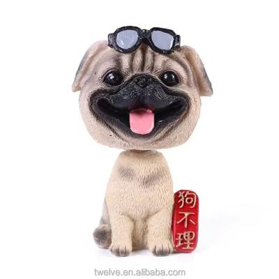 China Cute Europe Spring Dog Statue Nodding Head Shaking Heads Doll Car Accessories Interior Decoration for sale