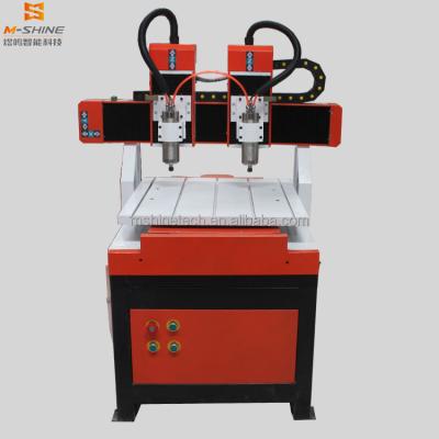 China Advertising/Wood Carving And Cutting Reducing Hot Sale Mini CNC Machine Good Price 4 Axis CNC Router Price, 4040 Mini CNC Router for sale