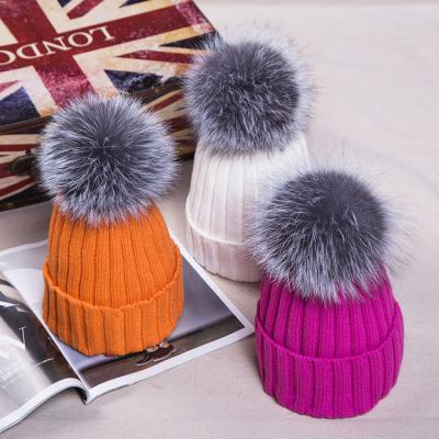 China New Winter Women's COMMON Cashmere 100 Beanies Acrylic Fur Hats With Fox Fur Pompom Balls for sale