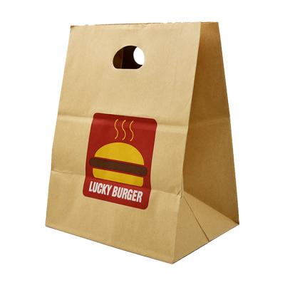 China Bio-degradable Customized Restaurant Fast Food Biodegradable Takeaway Custom Printed Store Carry Out Brown Kraft Paper Tote Bag with Handles for sale