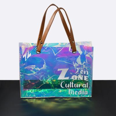 China Moisture Proof Custom Logo Fashion Casual PVC Laser Film Tote Bag Transparent Rainbow Color Gift Cosmetics PVC Shopping Bag with Handle for sale