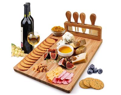 China Sustainable bamboo cheese board set, bamboo cheese board with 4 stainless steel cheese knives for sale