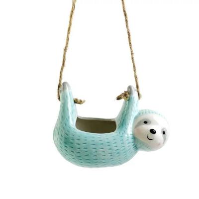 China Europe indoor and outdoor cute animal ceramic succulent cactus sloth decoration hanging planters for wholesale for sale