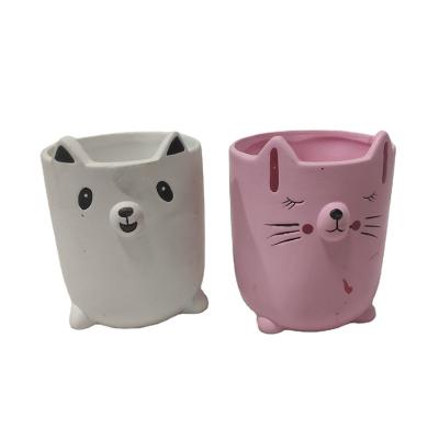 China Novelty New Product Ceramic Matte Finished Planter Garden Custom Cute Animal Face Pink And White Pots With Feet for sale