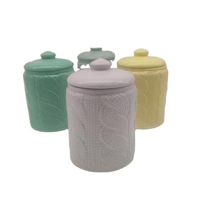 China Unique Cute Ceramic Colorful Glazed Ceramic Sweater Religious Texture Decor Kitchen Activities Food Storage Jars With Lids for sale