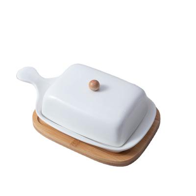 China Custom Sustainable Modern Luxury Ceramic Porcelain Kitchen Use White Butter Dish With Lid And Bamboo Tray for sale