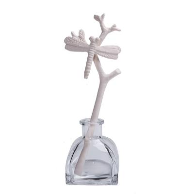 China Viable Custom Shape Porcelain Flower Ceramic Perfume Oil Diffuser With Glass Bottle for sale