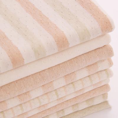 China Viable Wholesales Breathable Organic 100% Cotton Mesh Jacquard Muslin Baby Fabric for sale