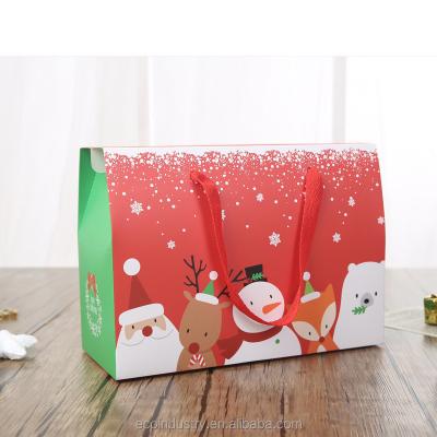 China Recycled Materials Christmas Gift Craft Paper Box With Handle Large Folding Box Xmas Gable Christmas Gift Box Large for sale