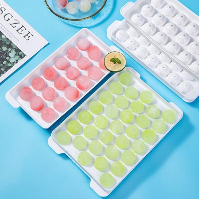 China Sustainable Food Grade Plastic Ice Tray With 33 Grids PP Round Ice Cube Maker BPA Free Kitchen Popsicle Mold With Lids for sale