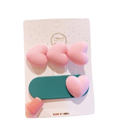 China Sweet Wholesale Kids Hair Accessories Resin Heart Shape Solid Color Hair Clip Cute Color Match Clip for sale