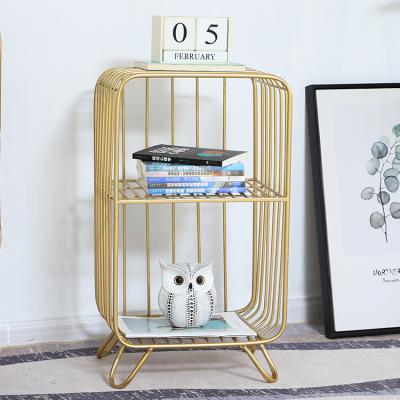 China Nordic Viable Iron Bookshelf Floor Living Room Bed Storage Shelf Student Bookshelf Ornaments Display Shelf INS for sale