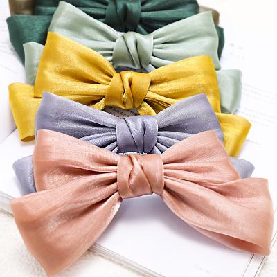 China 2020 New Style Bright Silk Crystal Gauze Bow Tie Clip Yarn Hair Pin With Big Bow Multiple Colors Are Available YTHC-1001 for sale